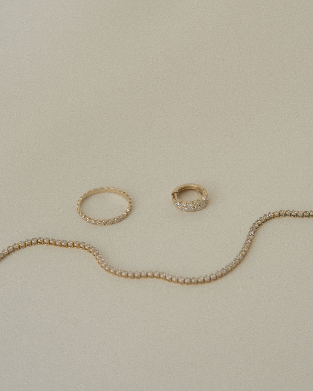 April-First-Berlin-Fine-Jewelry-14k-Gold-Diamond-Bezel-Ring-Bracelet-Huggies