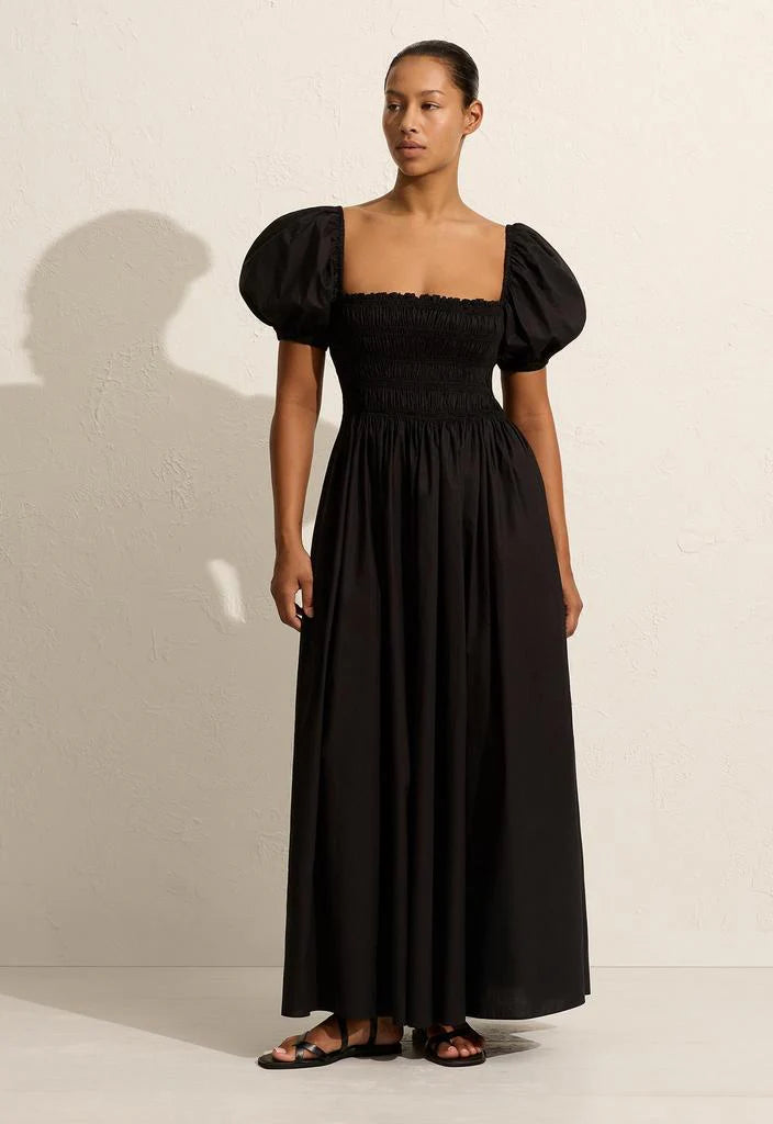 April First Berlin Matteau Shirred Bodice Peasant Dress Midi Dress in Black with puffed sleeve and a elastic ruched body