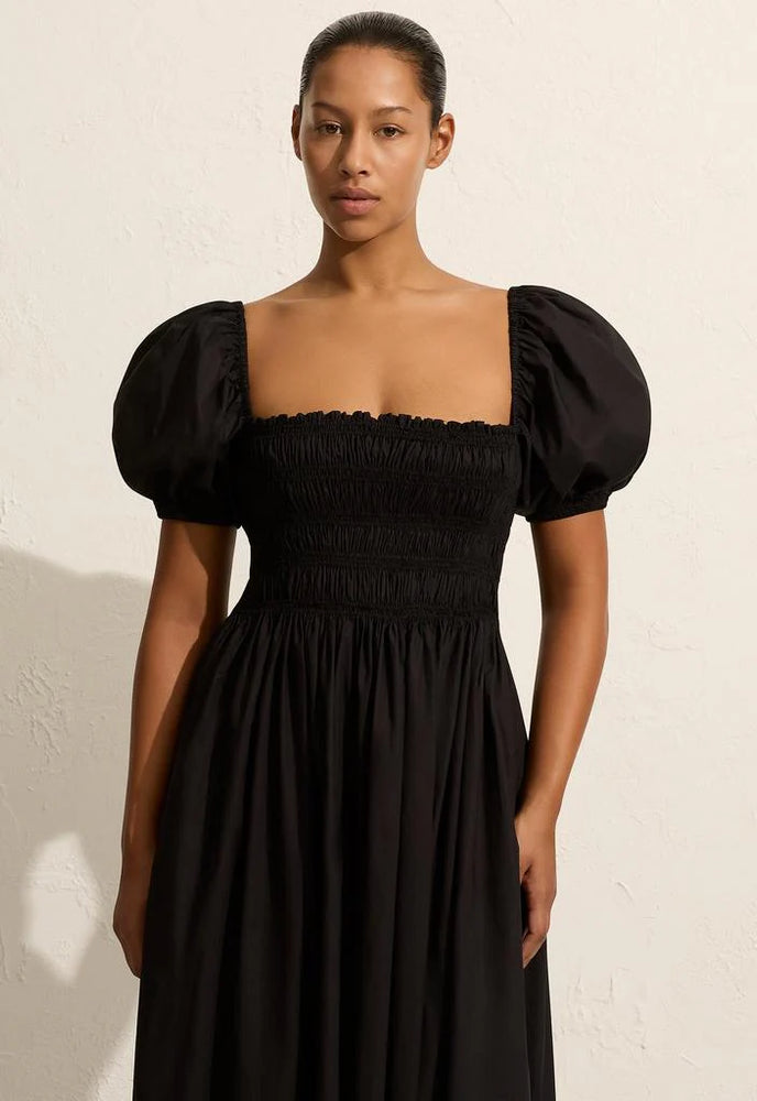 April First Berlin Matteau Shirred Bodice Peasant Dress Midi Dress in Black with puffed sleeve and a elastic ruched body