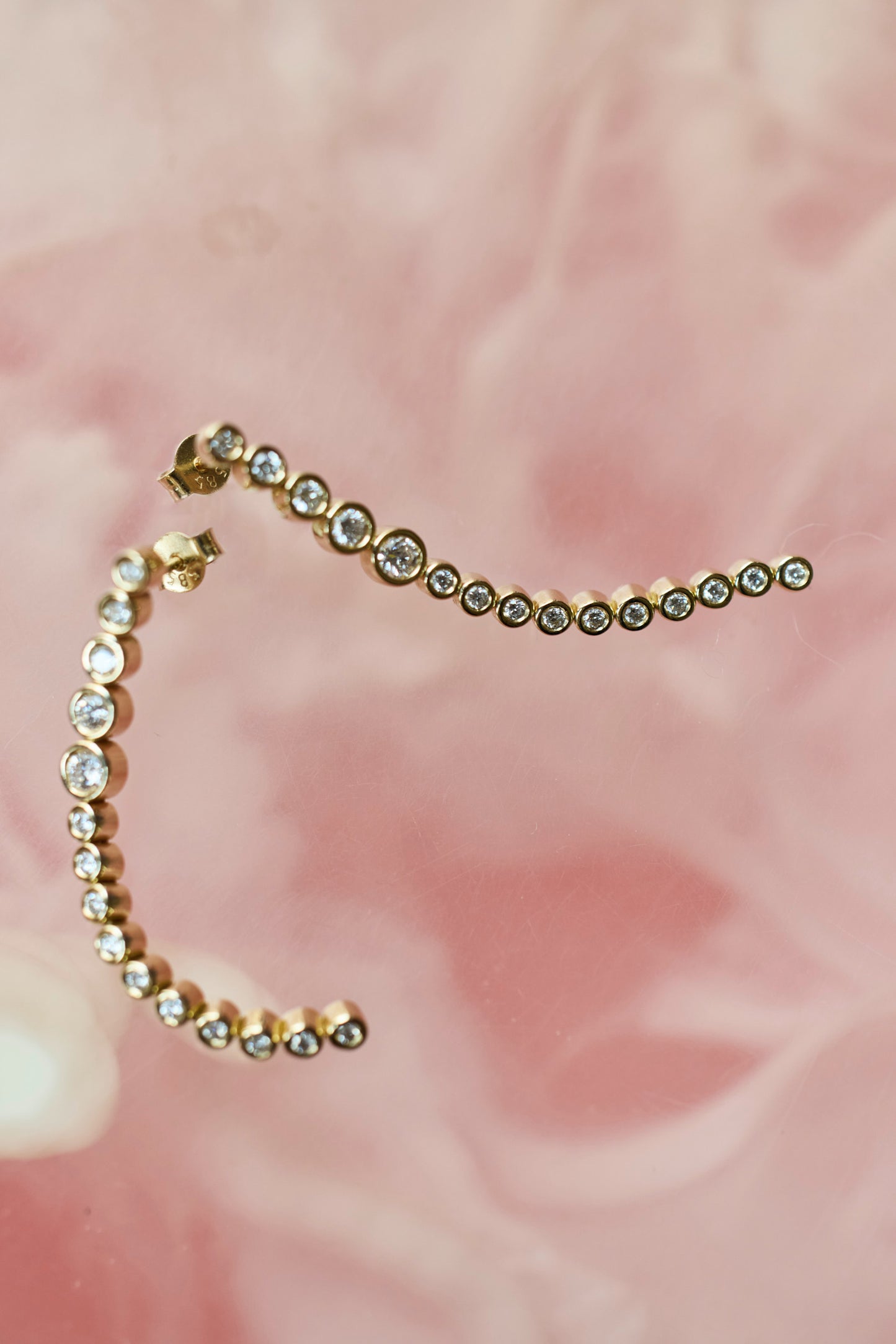 
                  
                    April-First-Berlin-14k-Gold-Bezel-Diamond-Drop-Earrings
                  
                