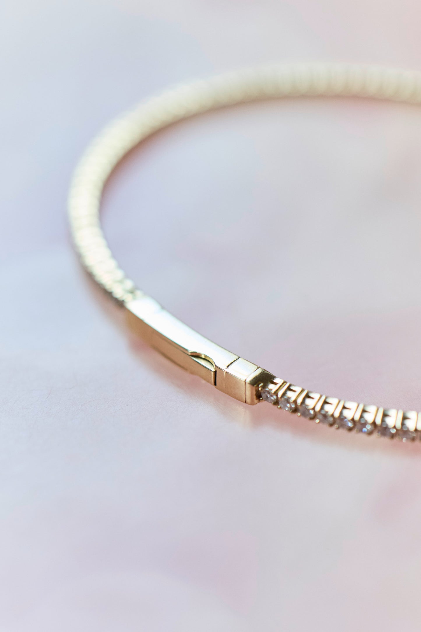 
                  
                    April-First-Berlin-Gold-Flex-Tennis-Bracelet-3
                  
                