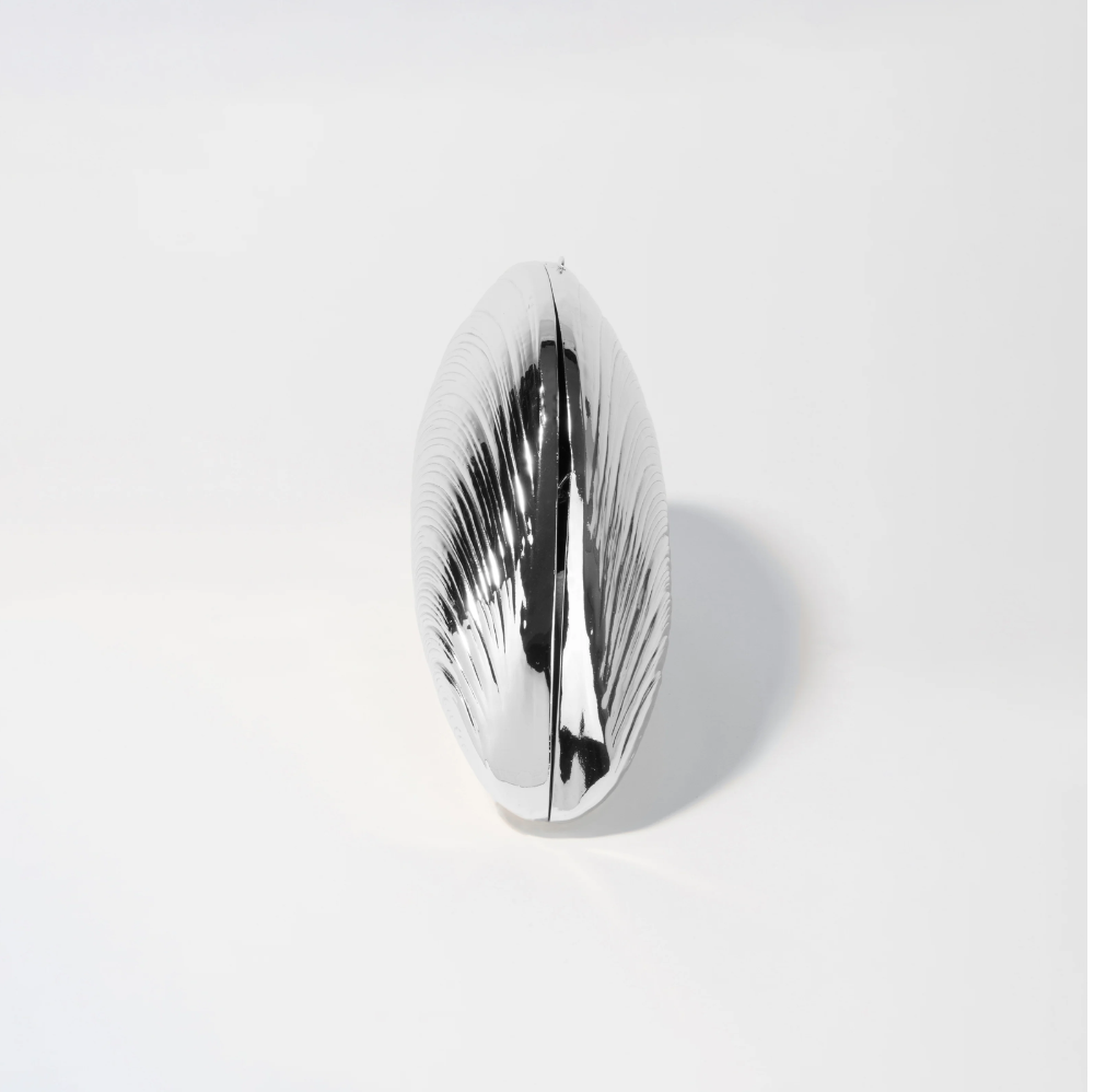 
                  
                    Metal Oyster Clutch
                  
                