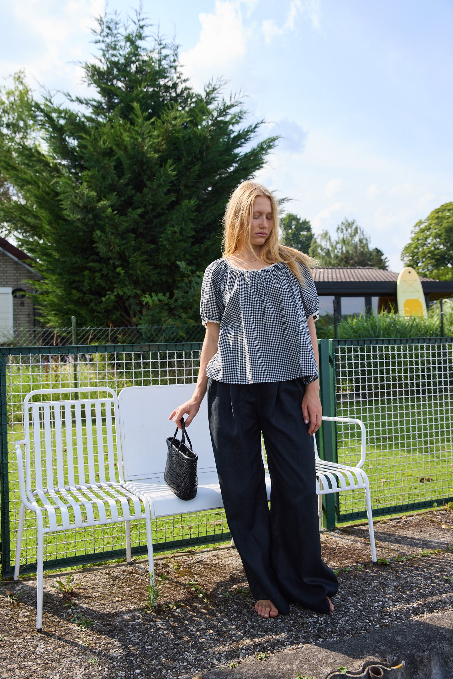 
                  
                    Maisie Top Black Sand
                  
                