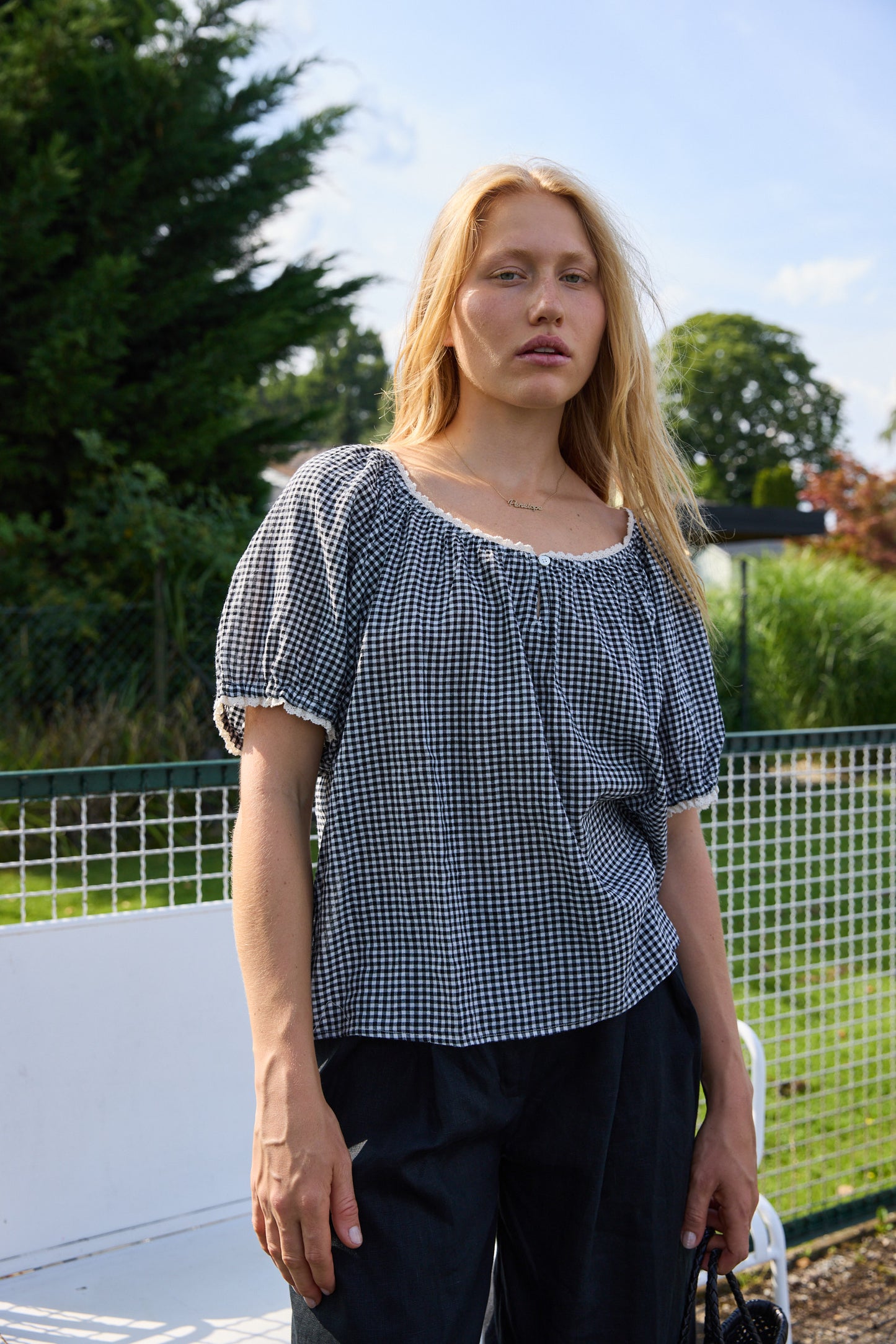 
                  
                    Maisie Top Black Sand
                  
                