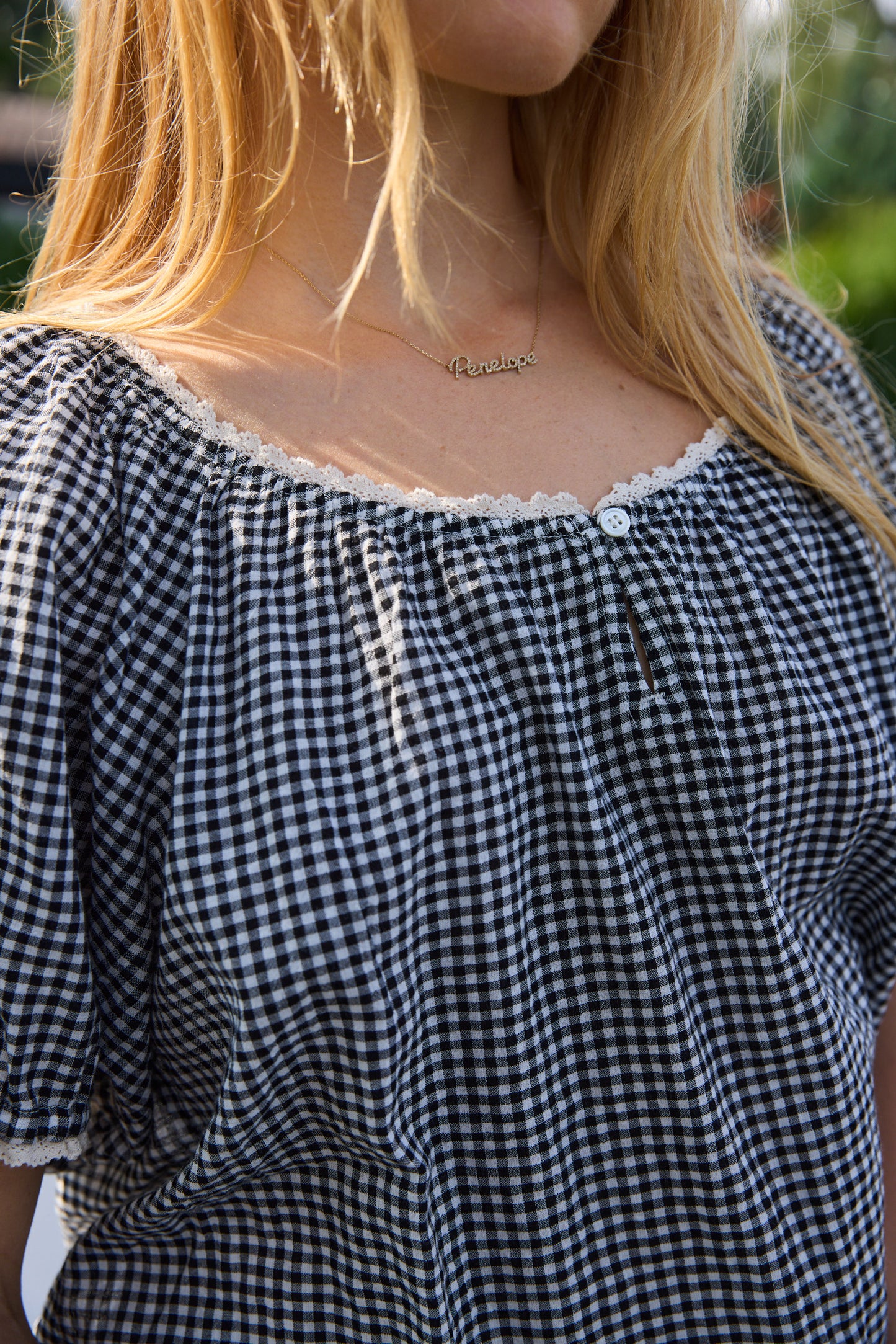 
                  
                    Maisie Top Black Sand
                  
                