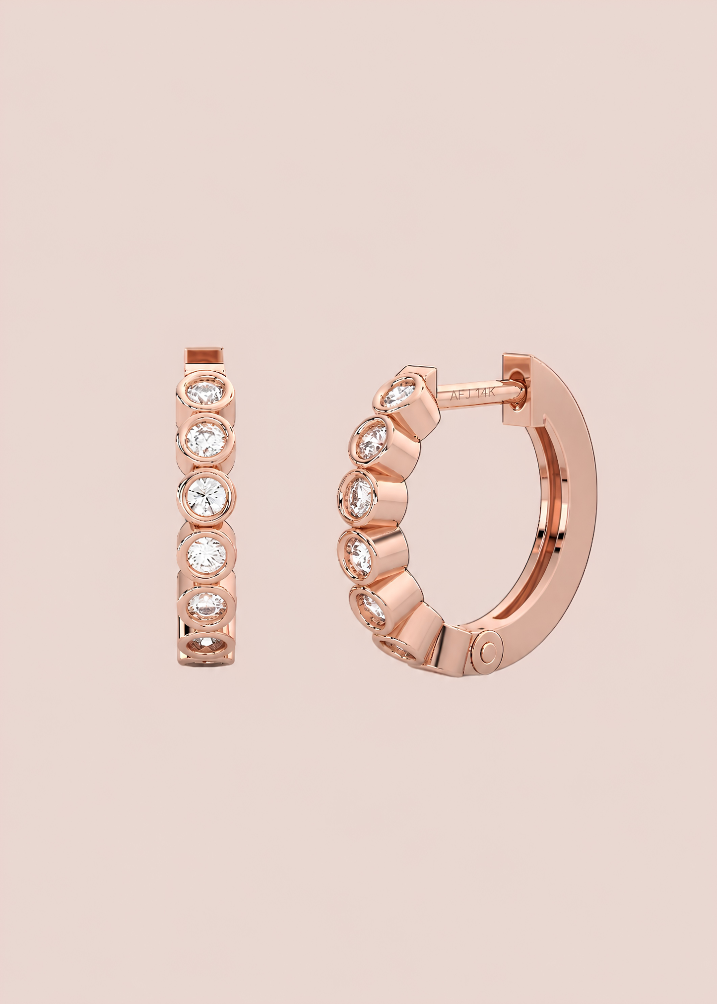 
                  
                    14k Gold Bezel Huggies
                  
                