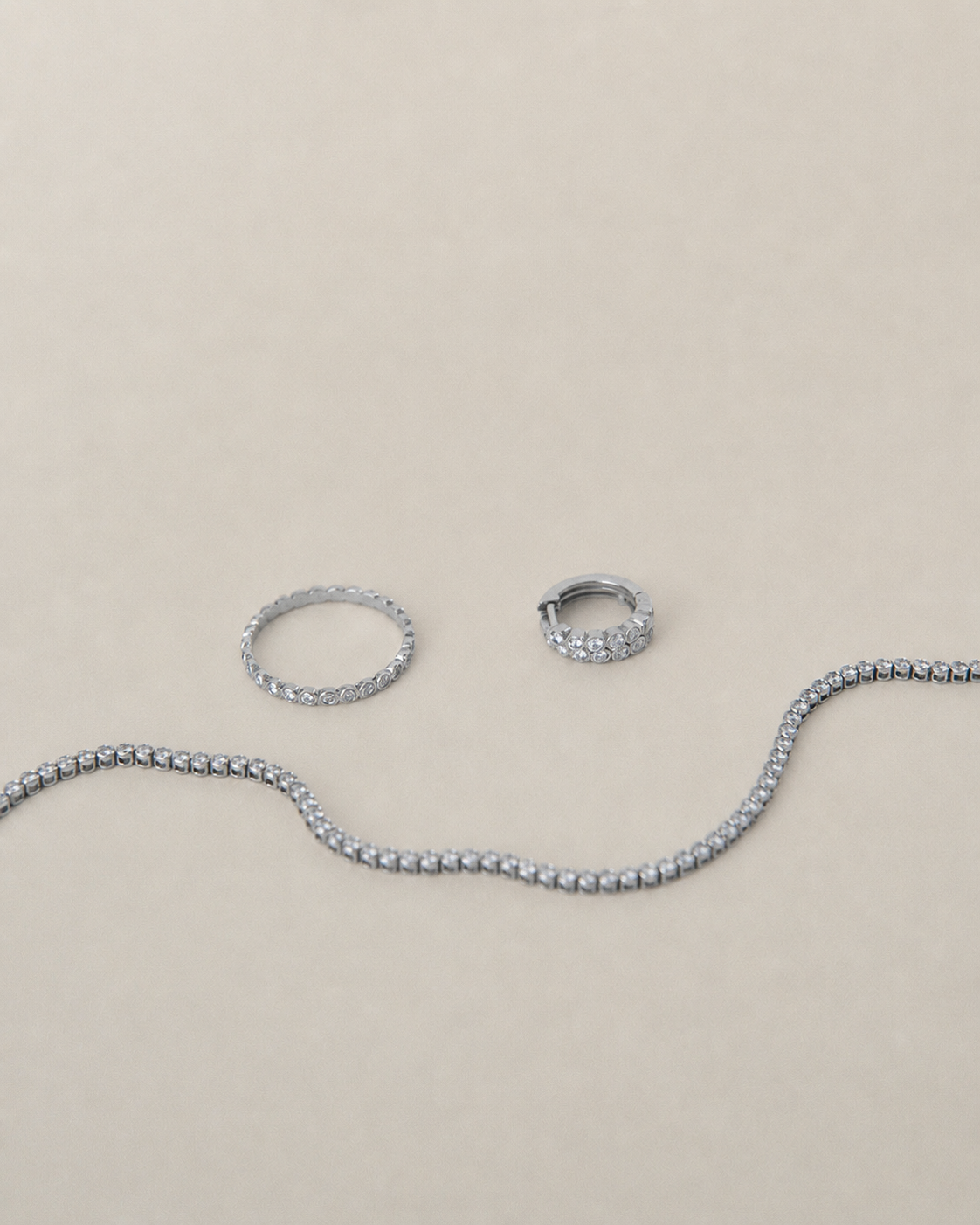 
                  
                    14k Gold Bezel Huggies
                  
                