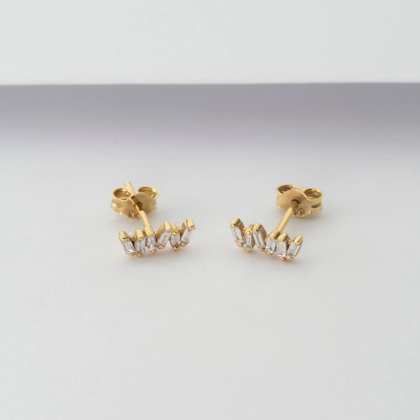 
                  
                    April First 14k Gold Diamond Baguette Cluster Stud
                  
                